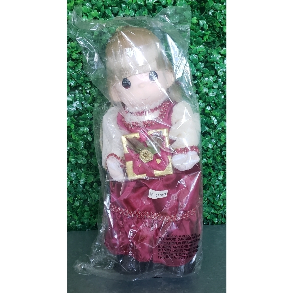 2. Christmas Precious Moments doll